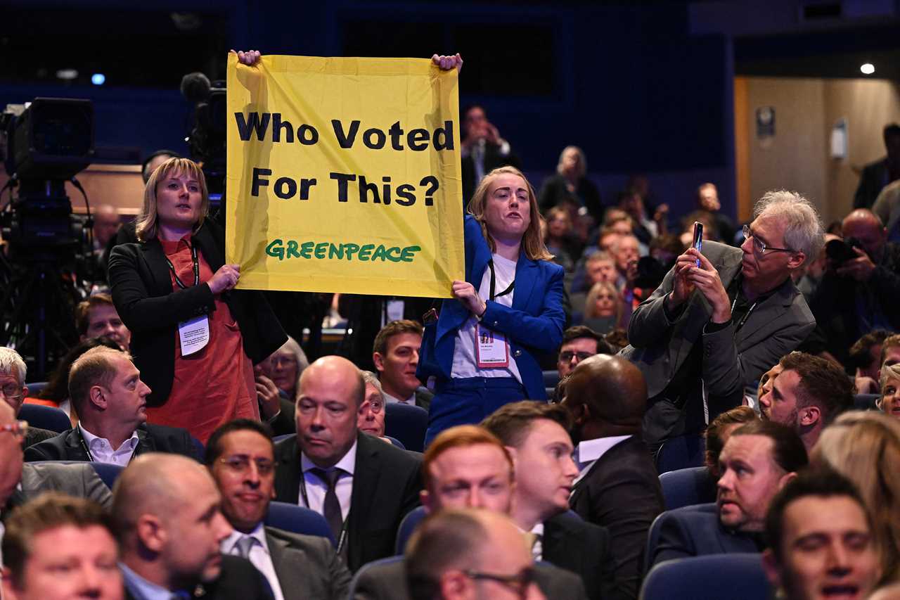 Eco activists ejected from the hall after interrupting Liz Truss’s conference speech