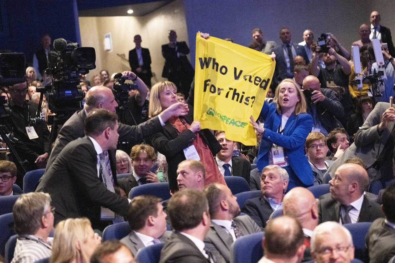 Eco activists ejected from the hall after interrupting Liz Truss’s conference speech