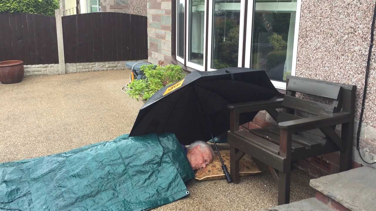 Shocking moment terminal cancer patient, 85, forced to wait on ground for ambulance for seven hours during downpour