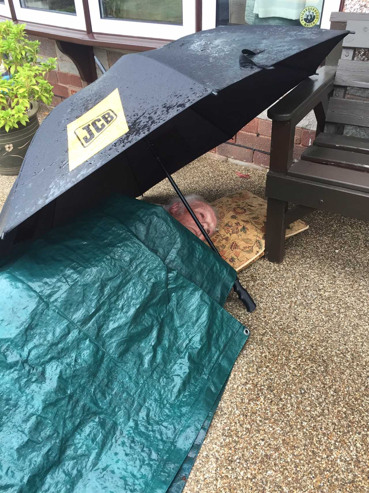 Shocking moment terminal cancer patient, 85, forced to wait on ground for ambulance for seven hours during downpour