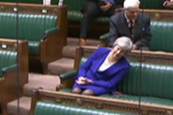 Theresa May mocks hardline Brexiteer by pretending to doze off in Commons debate