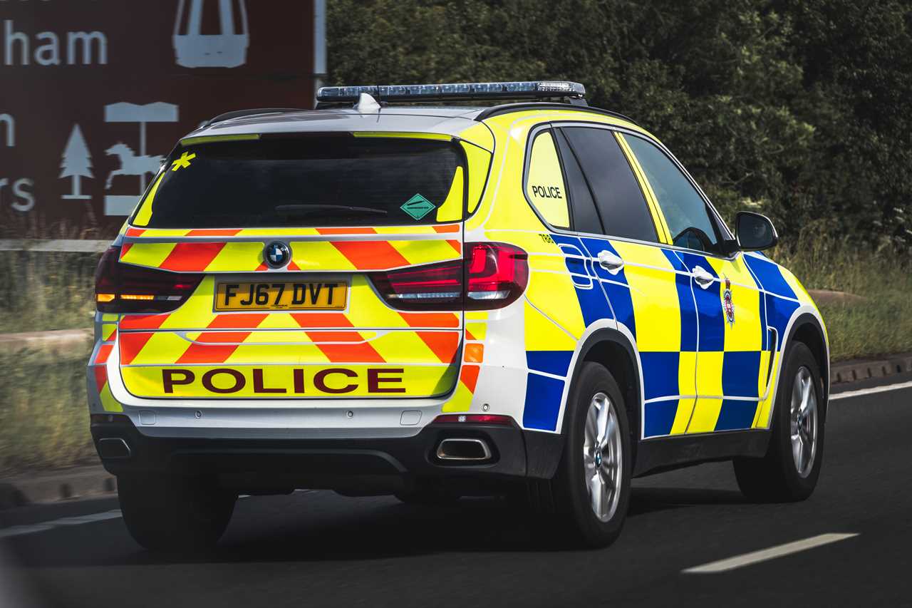 Marked Police 4x4 Responding to emergency speeding down motorway.