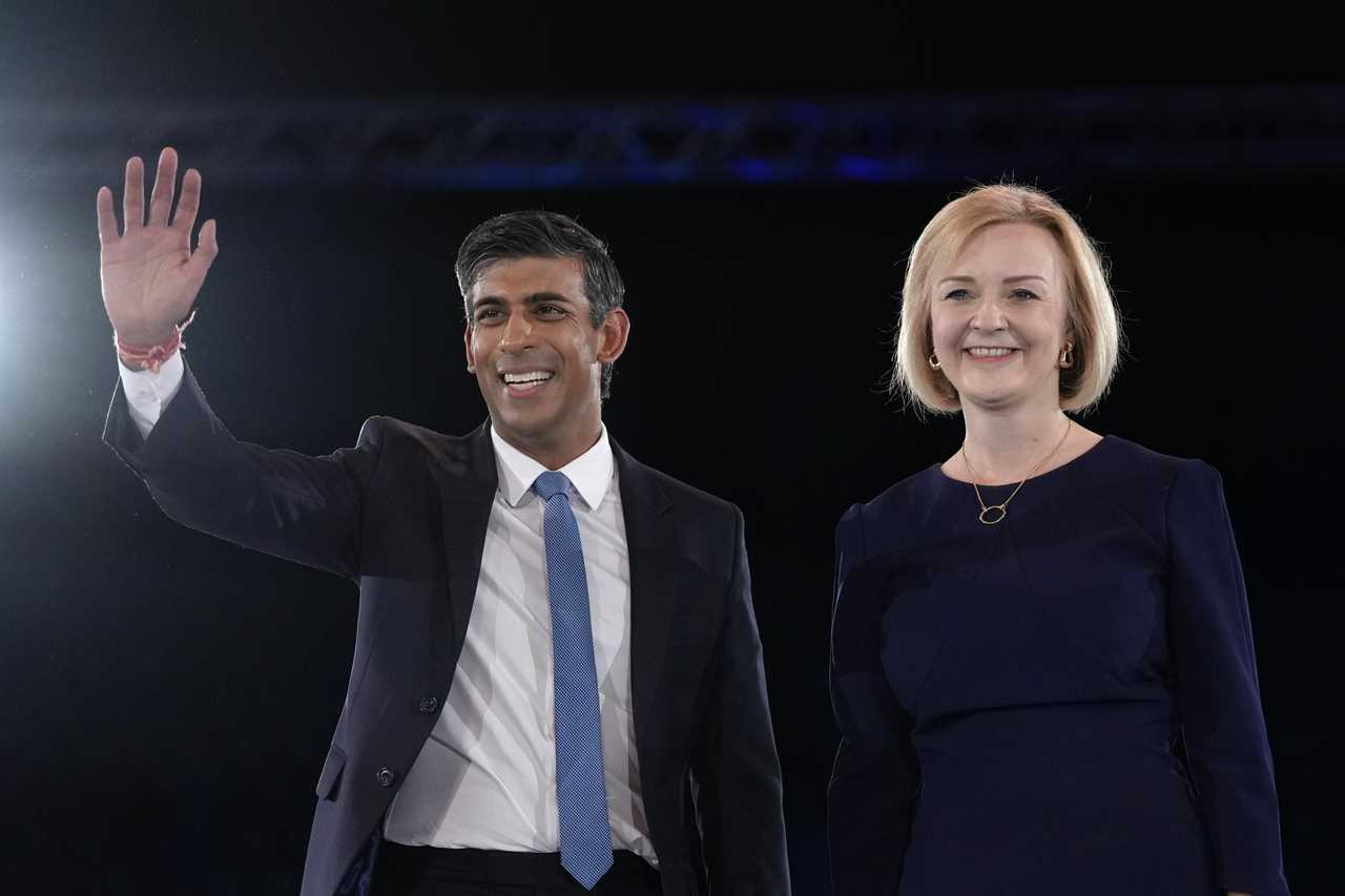 FILE - Liz Truss, right, and Rishi Sunak on stage after a Conservative leadership election hustings at Wembley Arena in London, Wednesday, Aug. 31, 2022. After weeks of waiting, Britain will finally learn who will be its new prime minister. The governing Conservative Party will announce Monday, Sept. 5, 2022 whether Foreign Secretary Liz Truss or former Treasury chief Rishi Sunak won the most votes from party members to succeed Boris Johnson as party leader and British prime minister. (AP Photo/Kirsty Wigglesworth, File)