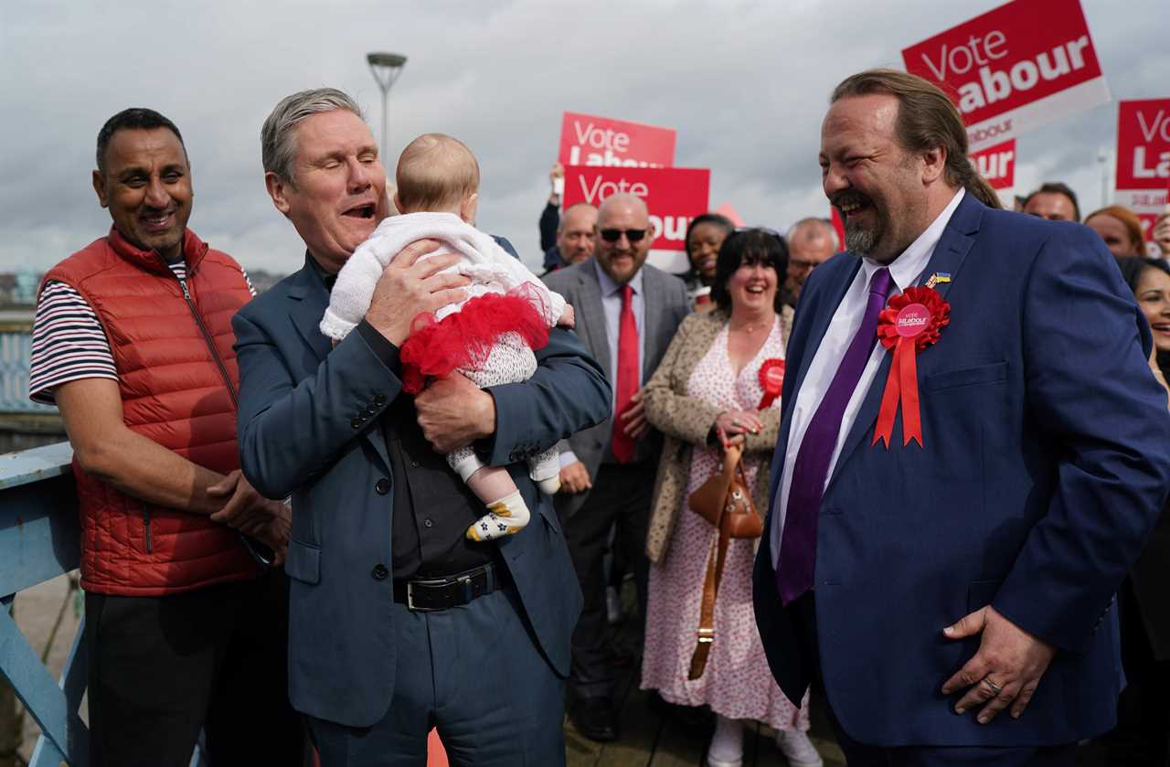 Labour leader Sir Keir Starmer holds five month old Hazel (no surname given) as he joins party members in Chatham, Kent, where Labour has taken overall control of Medway Council for the first time since 1998 after winning 30 of its 59 seats in the local elections. Picture date: Friday May 5, 2023. PA Photo. The Tories suffered major losses in Rishi Sunak's first electoral test as Prime Minister, with Labour claiming the results suggest Sir Keir Starmer will be able to replace him in No 10. The Liberal Democrats also made gains as the Tories lost control of a series of councils across England. See PA story POLITICS Elections. Photo credit should read: Gareth Fuller/PA Wire