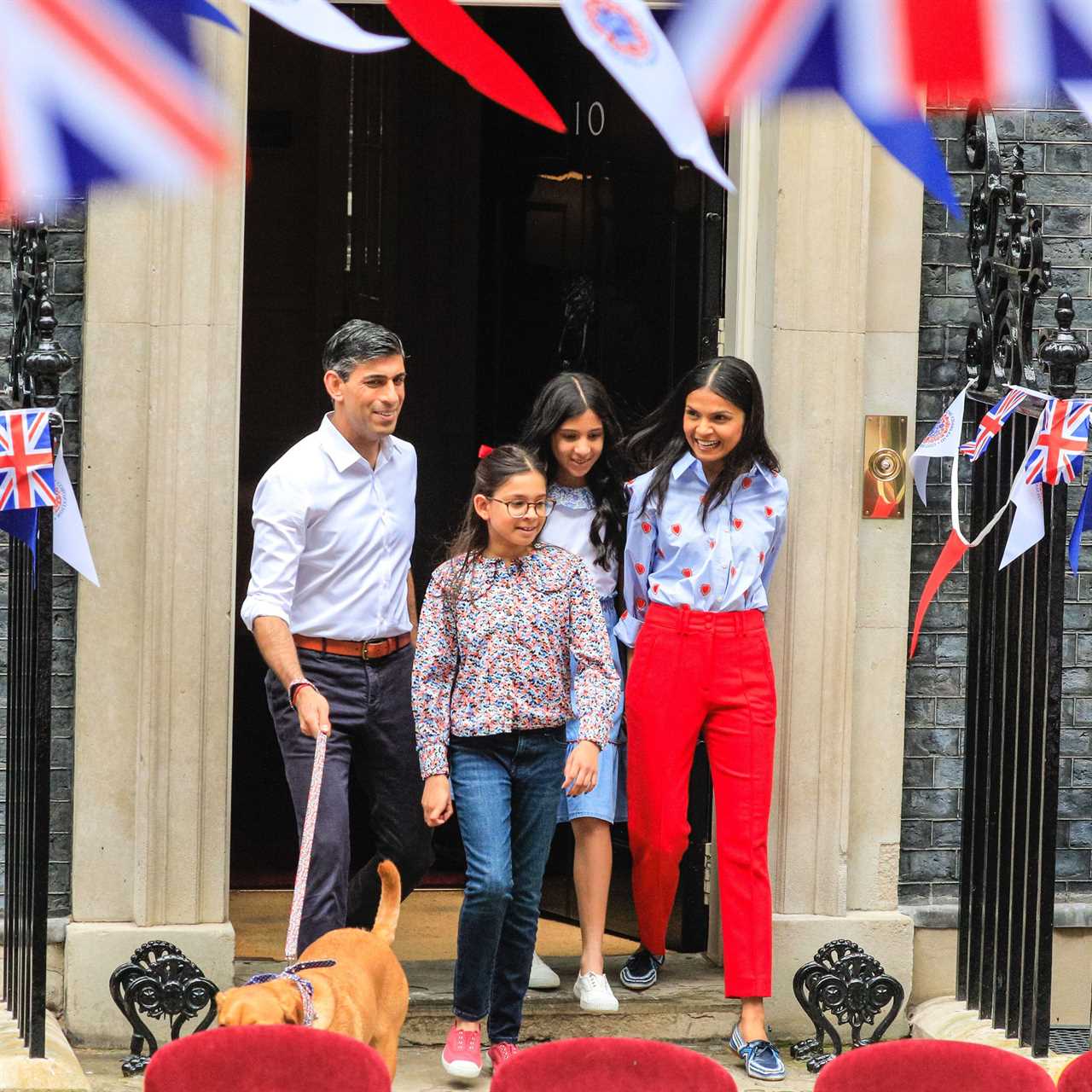 Alamy Live News. 2R088M8 London, UK, 07th May 2023. Trending In The Newsak family join the lunch. British Prime Minister Rishi Sunak, his wife Akshata Murty, daughters Krishna and Anoushka and Labrador Nova host a Coronation Big Lunch in Downing Street, with special guests Dr. Jill Biden, the US First Lady, and her granddaughter Finnegan, in attendance. Community heroes, Ukrainian families, recipients of the Points of Light Award, youth groups and others gather in Downing Street today for a special Coronation lunch. This is an Alamy Live News image and may not be part of your current Alamy deal . If you are unsure, please contact our sales team to check.