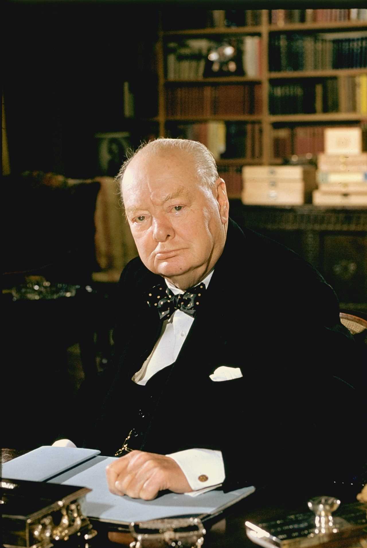 British politican Sir Winston Churchill, formal portrait at desk.  (Photo by Carl Mydans//Time Life Pictures/Getty Images)