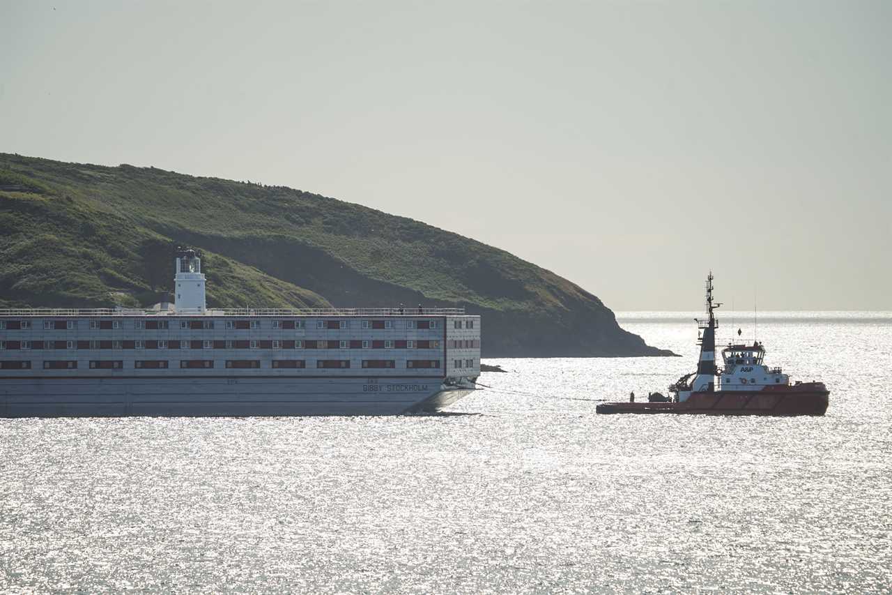 First pictures of refurbished small boat migrant barge as it leaves to host 500 asylum seekers within days