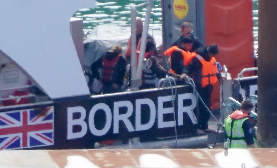 Evil people smuggler threw a dozen helpless migrants including women overboard from dinghy during Channel crossing