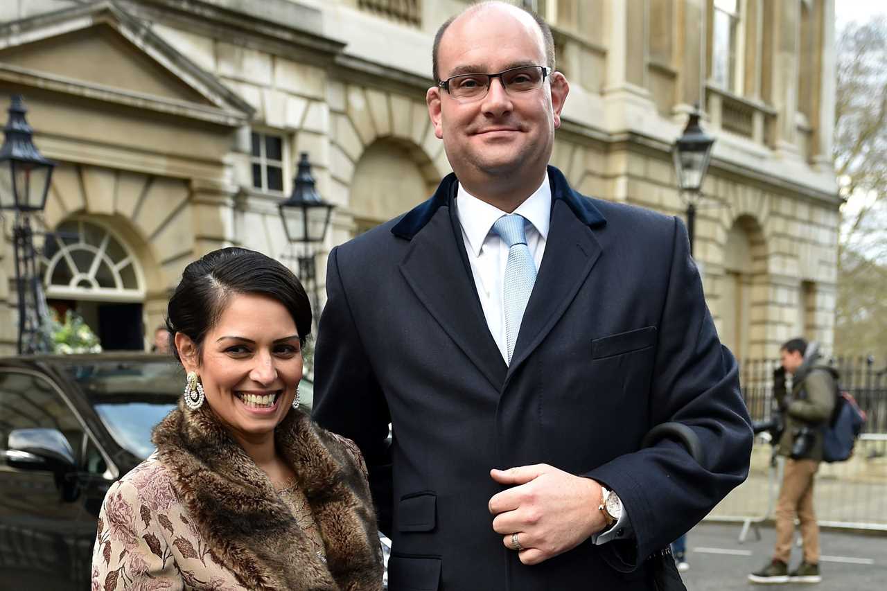 Alex Sawyer with his wife Priti Patel