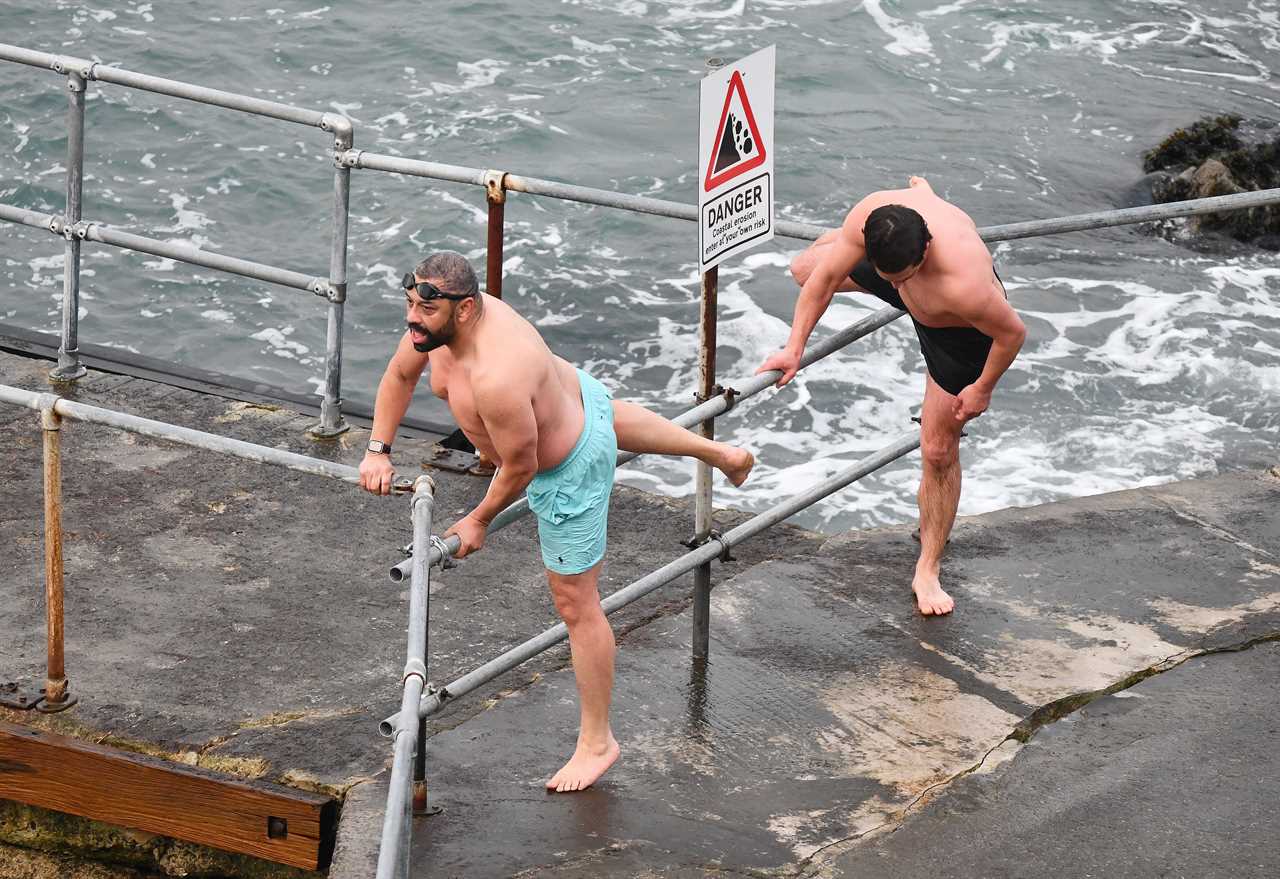 Home Secretary James Cleverly and Tory MP Johnny Mercer take a dip in the sea to connect with voters