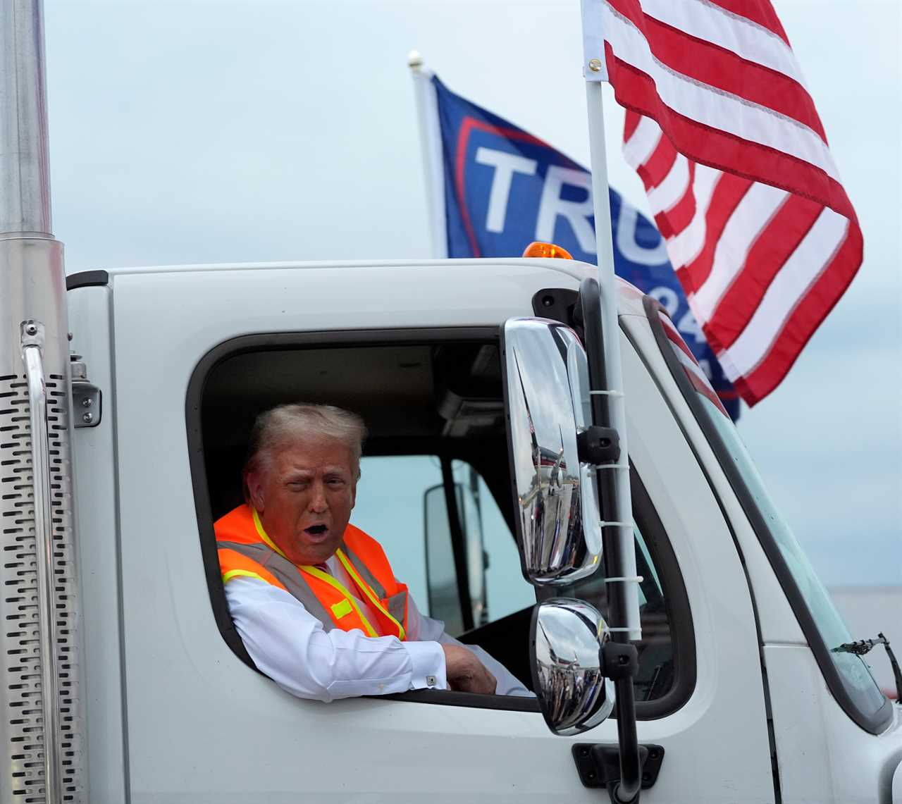 Trump Rides in Rubbish Truck After Biden's 'Garbage' Comment