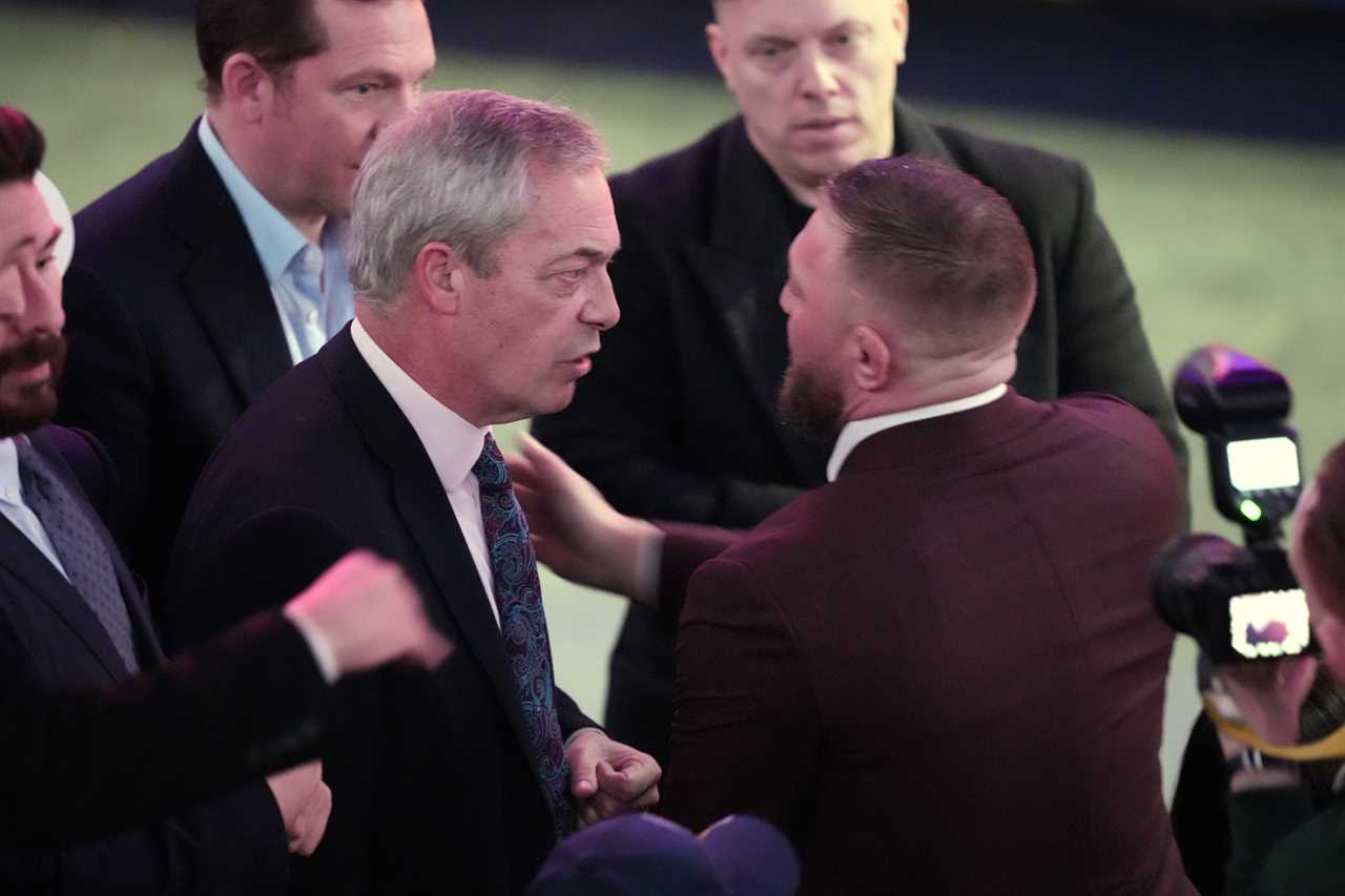 Nigel Farage poses with Conor McGregor at Trump rally